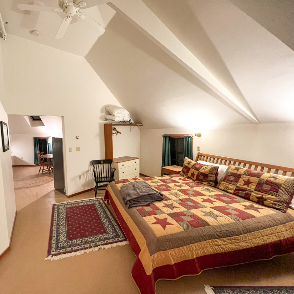 Studio Suite #12, a private 2nd-floor suite with a king bed, Jacuzzi tub & fully equipped kitchen