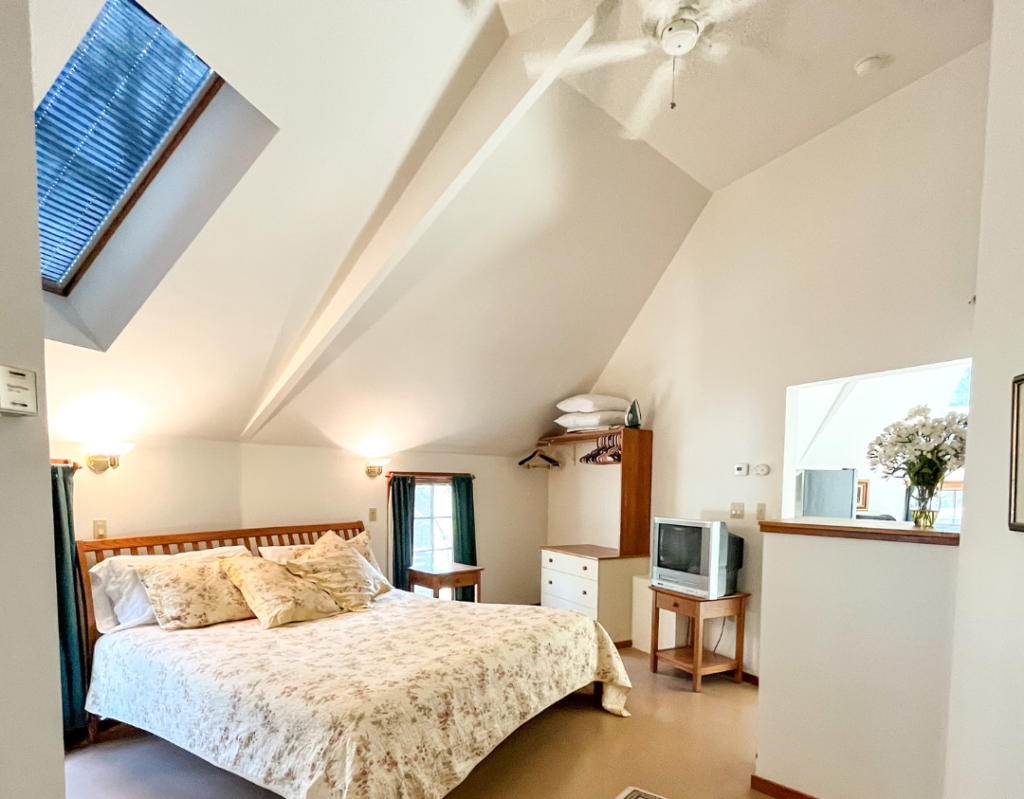 Studio Suite #13 offers a king bedroom with five windows