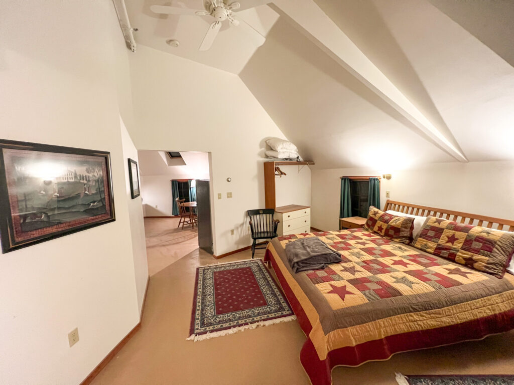 Studio Suite #12, a private 2nd-floor suite with a king bed, Jacuzzi tub & fully equipped kitchen