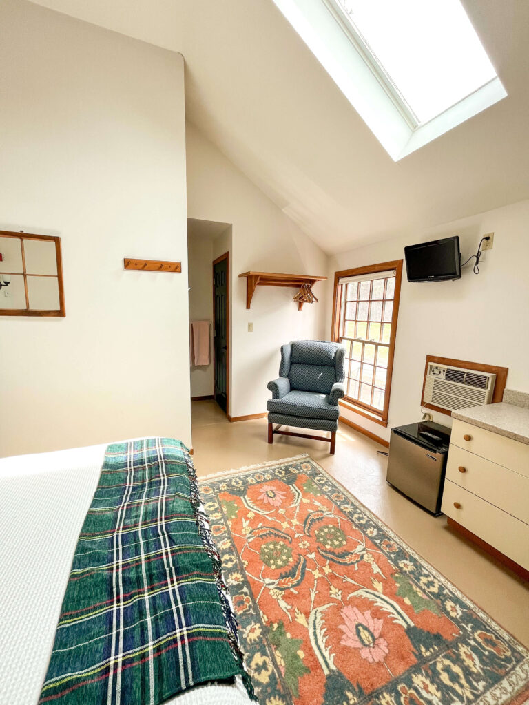 Unit #3 – 1-Bedroom Apartment Comfy room with a nice window to let the light in.