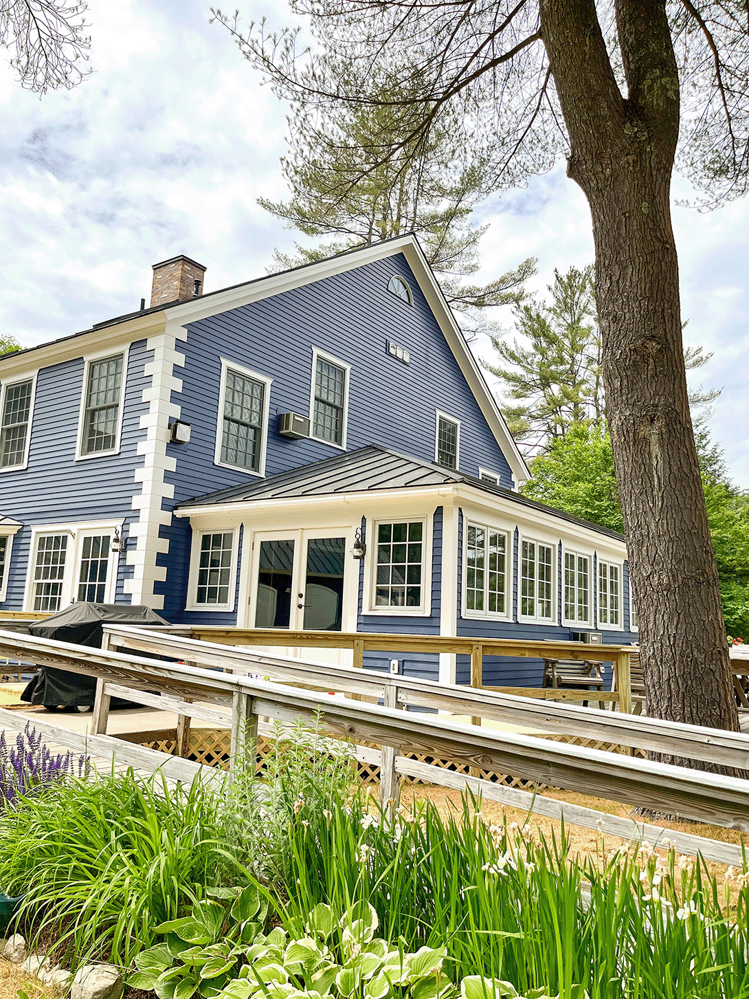 Entrance to the hotel, blue house for the Short-Term Rentals in Lyme NH