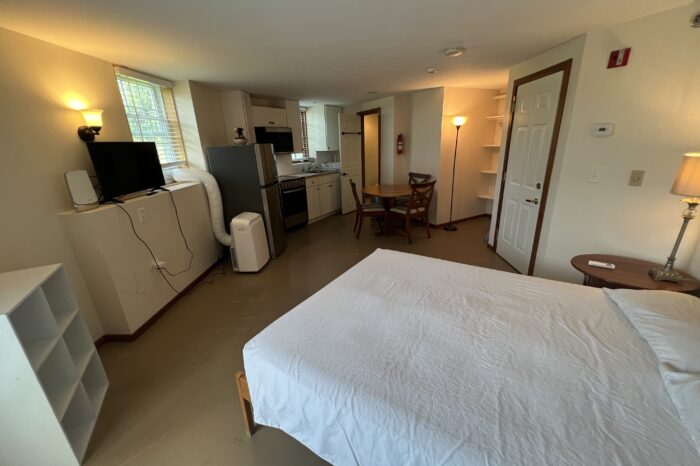 Studio #15 with a queen bed, full kitchen & private bath