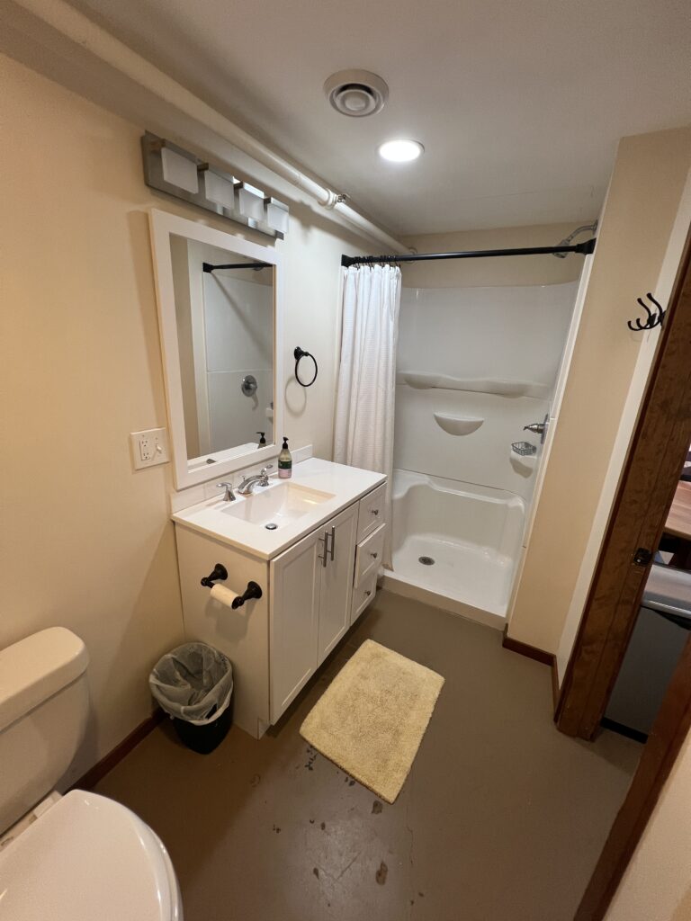 Studio #15 with a queen bed, full kitchen & private bath