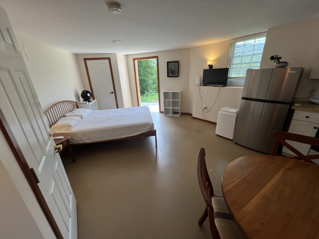 Studio #15 with a queen bed, full kitchen & private bath